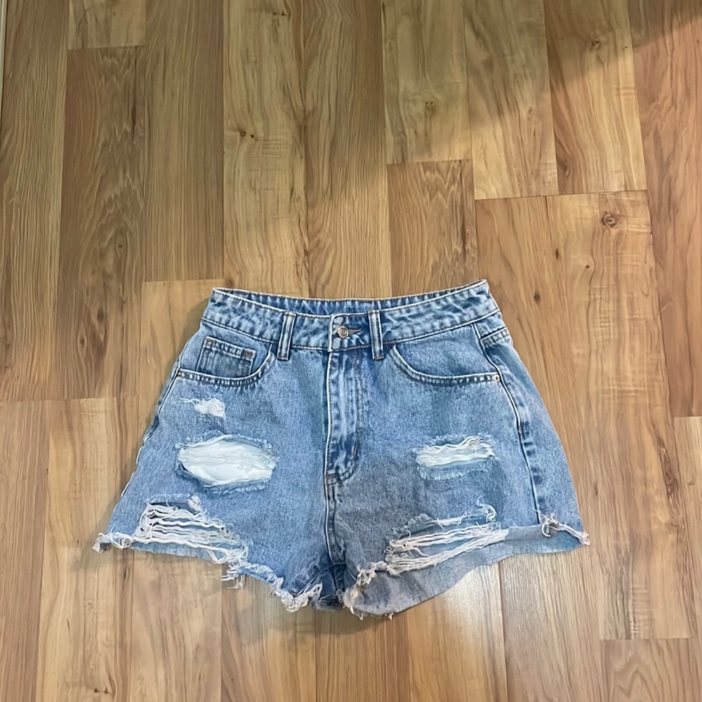 darkish blue ripped jeans